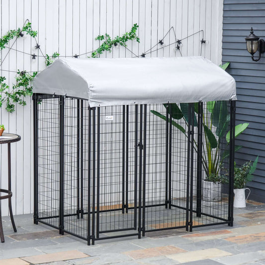 6'x4'x6' outdoor dog playpen with lockable door and water-resistant canopy in a garden setting.